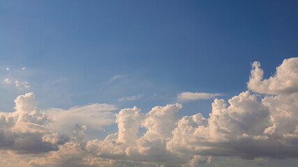 Wall Mural - Cumulus clouds with blue sky on a sunny day of summer. Beautiful cloudscape