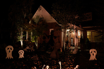 Wall Mural - Halloween night lights decorating house in California