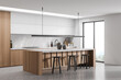 Breakfast bar and linear light in minimalist white and grey kitchen