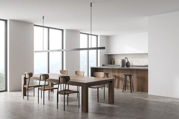 Minimalist white and wood kitchen with linear light. Corner view.