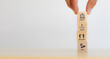 Change management concept. Hand holding wooden cubes with icon illustrate with agile, motivation, change and flexibility on white background. Banner for business adaptation in digital transformation.
