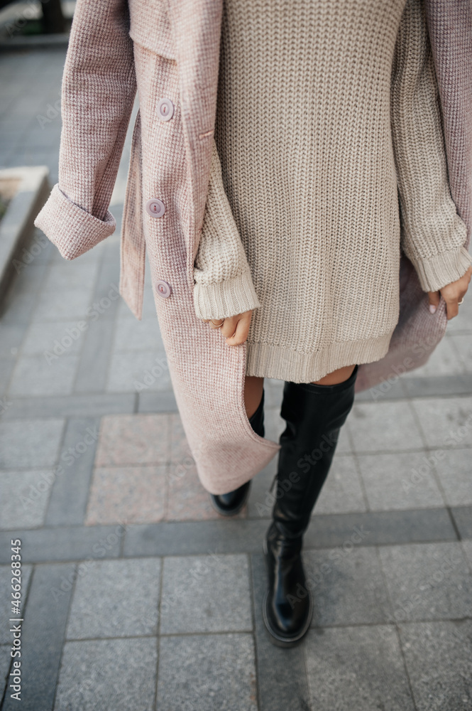 beige dress black boots 15 Ways to Wear Dresses With Boots This Fall