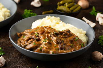 Beef Stroganoff with mushrooms and mashed potatoes.