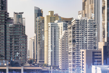  Forex and stock market chart hologram over panorama city view of Bangkok, the financial center in Southeast Asia. The concept of international trading. Double exposure.