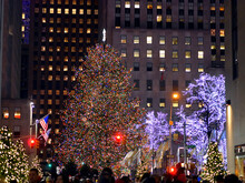 Beautiful View Of A Rockefeller Center And A Christmas Tree In Front Of It In The New USA