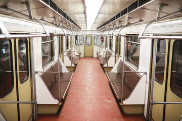 Subway car with empty seats. Empty subway.