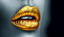 Golden Lipstick Closeup. Metal Gold Lips. Beautiful Makeup. Sexy Lips, Bright Paint On Beautiful Model Girl's Mouth, Close-up. Clack And White. Metallic Lipstick Closeup. Isolated On Black Background