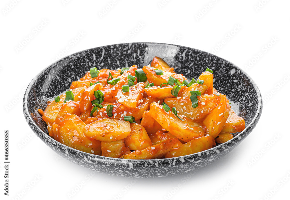 Plate with honey chilli potato on white background