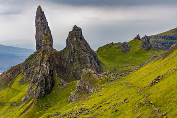 Wall Mural - Walkers and hikers on the dramatic mountains of the Trotternish Ridge and Storr on the Isle of Skye, Scotland