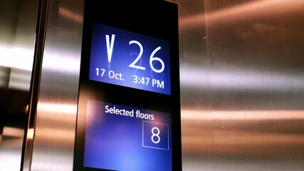 Floor number display in the elevator moving downstairs.