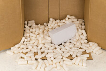 Cardboard Box With Styrofoam Filler For Safe Packaging. Gift Package