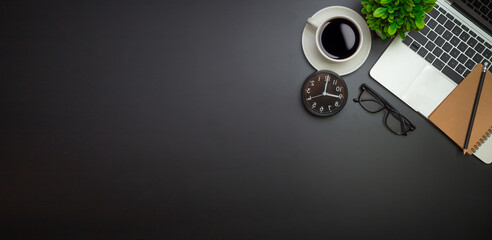 Workspace - Flat top view illustration of a workspace with a coffee cup and notebook on the black desk surface,Office desk concept.