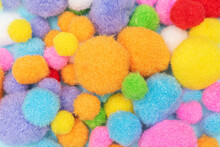 Colorfull Fluffy Balls Background. Pile Of Colorfull Fluffy Balls. Creative Textile Balls Pattern.