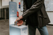 Man pressing for alcohol sanitizer