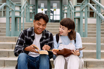 Diverse students studying together at college campus