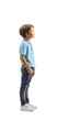 © Ljupco Smokovski - Full length profile shot of a boy in a blue t-shirt standing and watching something
