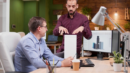 Poster - Architects discussing building construction analyzing architectural maquette prototype developing innovation structure while working in creative company office. Architecture project