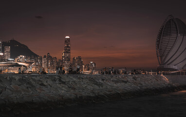 Wall Mural - Cityscape at Victoria Harbour in Hong Kong; Golden color tone