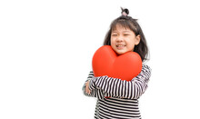 Self Esteem.Child Abuse.Children Kid Harassment.Asian Girl Child Holding Red Heart For Share Donate.Pediatric.family Health Insurance.World Heart Day, Health Day, Love,Dental Care.Adoption Foster Kid.
