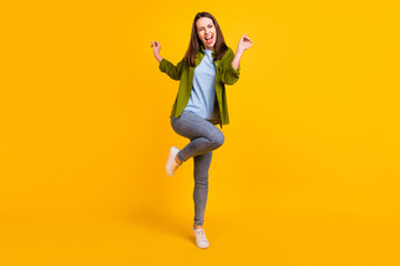 Sticker - Photo of charming funky young lady wear green shirt smiling dancing isolated yellow color background