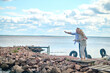 © zinkevych - Surprised joyful man and woman having rest near sea