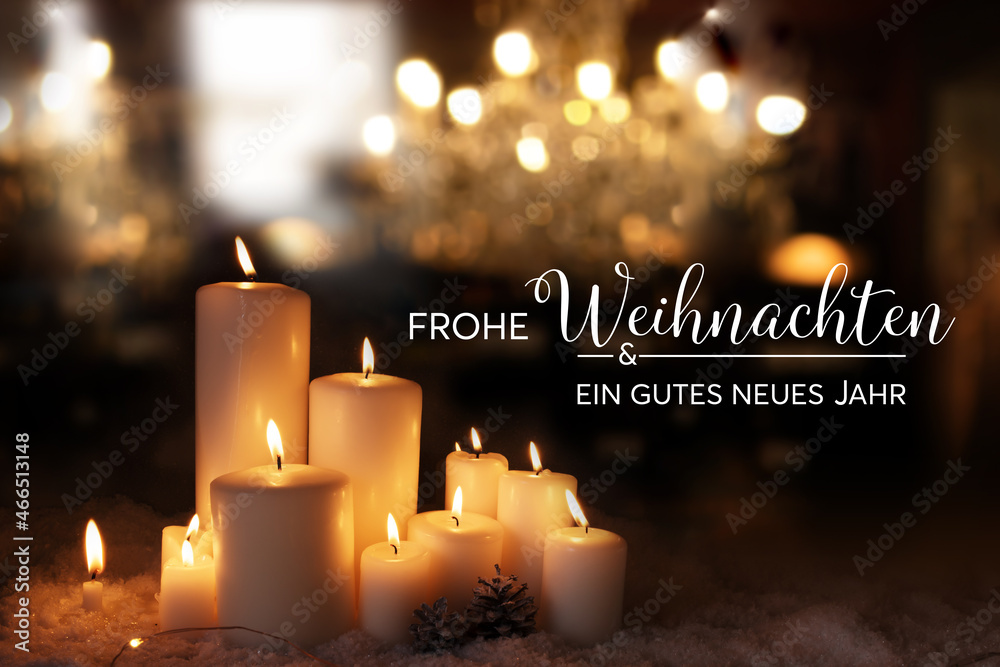Christmas and new year greeting card with candle lights and golden ...