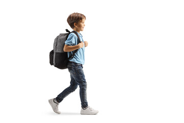 Poster - Full length profile shot of a boy with a backpack walking