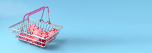 New Year Shopping Concept. Shopping Basket With Red Snowflakes On A Blue Background.