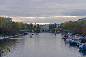 Wall Mural - Paris, France - 10 23 2021: View of the Ourcq canal from the lift bridge at sunrise