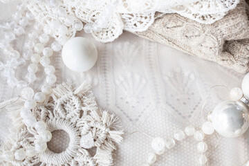 Wall Mural - Beautiful delicate white christmas background with beads, balls, new year decor