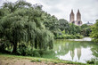 New York City Manhattan Central Park panorama in summer and lake with skyscrapers and colorful trees with reflection