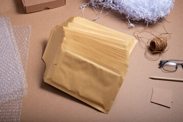 Lot of brown bubble envelopes on the office desk