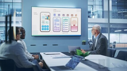 Office Conference Room Meeting: Digital Entrepreneur Pitches e-Commerce Social Media Software App to Two Investors. Wall TV Screen Show Animation of UI UX Working, Customer Support. Static Wide Shot