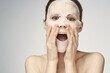 © VICHIZH - woman with bare shoulders face mask skin care procedures