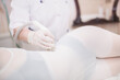 © Vera - Lymphatic drainage massage LPG apparatus process. Woman in white suit getting anti cellulite massage in a beauty SPA salon. LPG, and body contouring treatment in clinic. Massage procedure. Body care