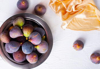 Wall Mural - Portion of fresh Figs on light background