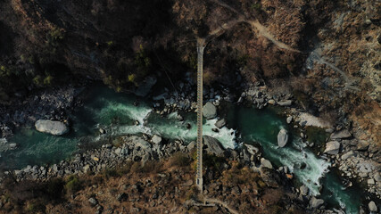 Poster - View of the river flowing between rocks.