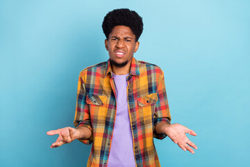 Wall Mural - Photo of angry annoyed dark skin man wear plaid shirt asking understand him isolated blue color background