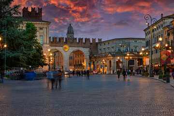 Wall Mural - medieval gates to piazza bra in verona at night, italy. architecture and landmark of verona. cozy ci