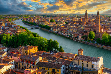 Fototapete - Sunset aerial view of Verona, Italy. Architecture and landmark of Verona. Cozy cityscape of Verona.