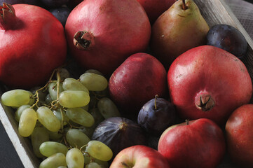 Wall Mural - Fruit plate - plums, pears, apples, pomegranates, grapes, figs