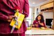 © yurakrasil - african american couple celebrate 14 february valentines day in living room
