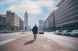 © Eugenio Marongiu - Back view young adult businessman strolling city walking away