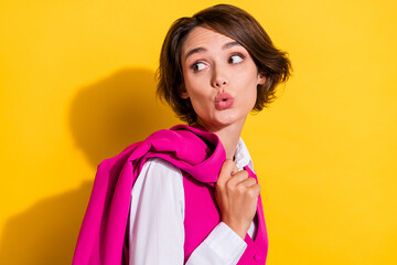 Sticker - Portrait of attractive amazed businesswoman agent looking aside copy blank space isolated over bright yellow color background