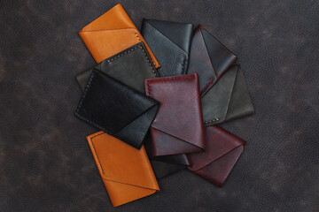 There are many different colored card holders. Unisex card holder made of genuine soft leather. Accessories made of leather made by hands