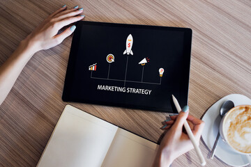 Wall Mural - marketing strategy diagram on device screen. business concept.