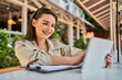 © Тарас Нагирняк - Portrait of beautiful woman with tablet working outdoors wit tablet