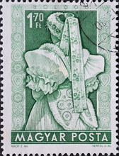 Hungary Circa 1953: A Post Stamp Printed In Hungary Showing A Hungarian Folklore Costume And Headgear From The Region: Boldog