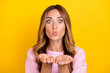 © deagreez - Photo of young attractive woman send air kiss you coquettish date romantic isolated over yellow color background