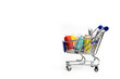 © alenka2194 - Trolley with thread on a white background . Thread selection. Shopping for needlework. White background.